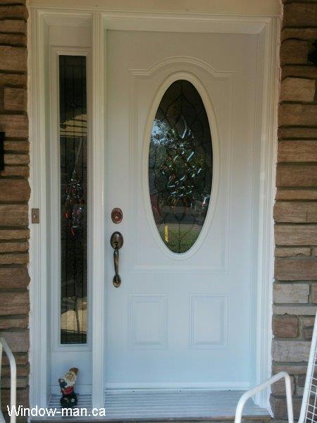 Front door replacement. Single entry steel insulated white oval glass full glass sidelight. Peterborough Classic stained glass catalog. Beveled Glass with patina caming